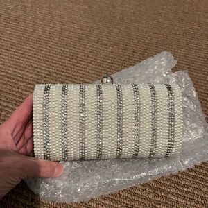 Natasha Pearl and rhinestone clutch